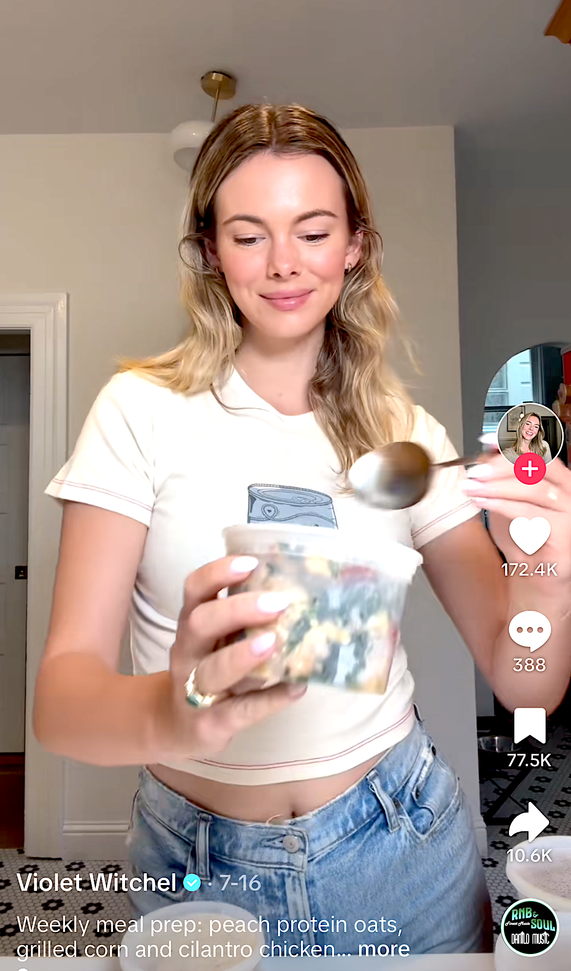 Violet Witchel smiles while holding a container of meal-prepped food and spoon