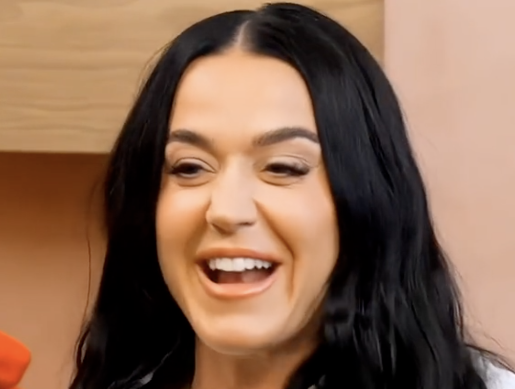 Katy Perry smiling while speaking, with caption "sorry but Katy Perry was too real for saying this lmaoo"