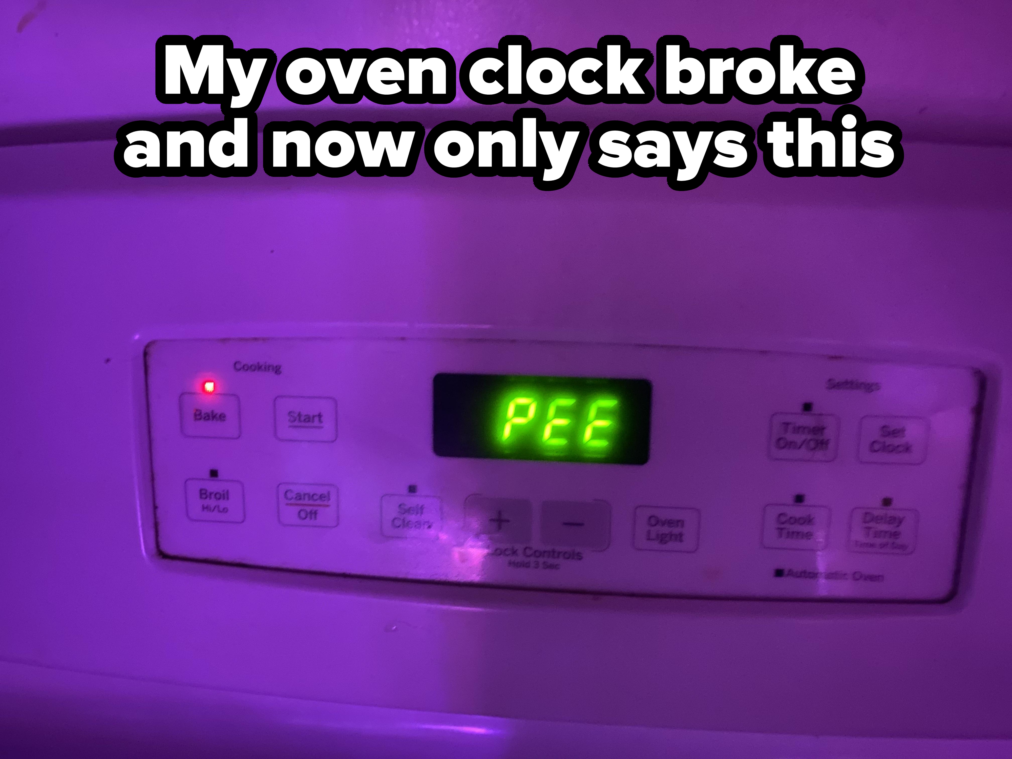 The stove's control panel displays the word "PEE" in green letters, with various cooking option buttons visible around it