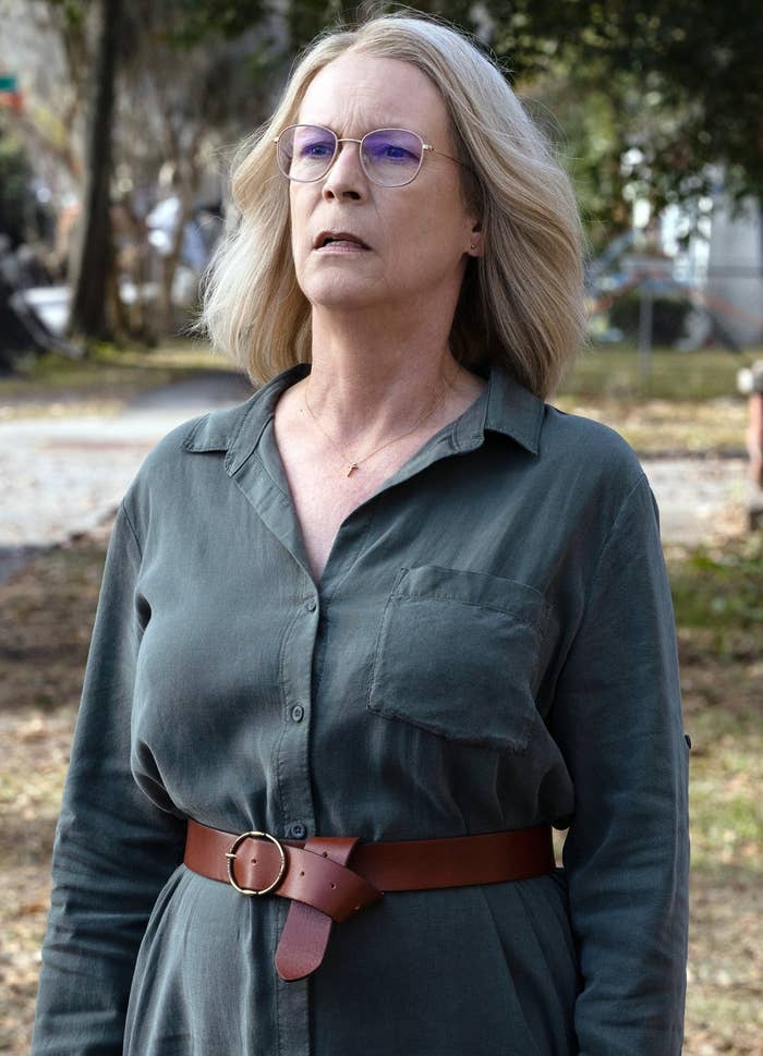 Jamie Lee Curtis wearing casual clothing, standing outside in "Halloween Ends"