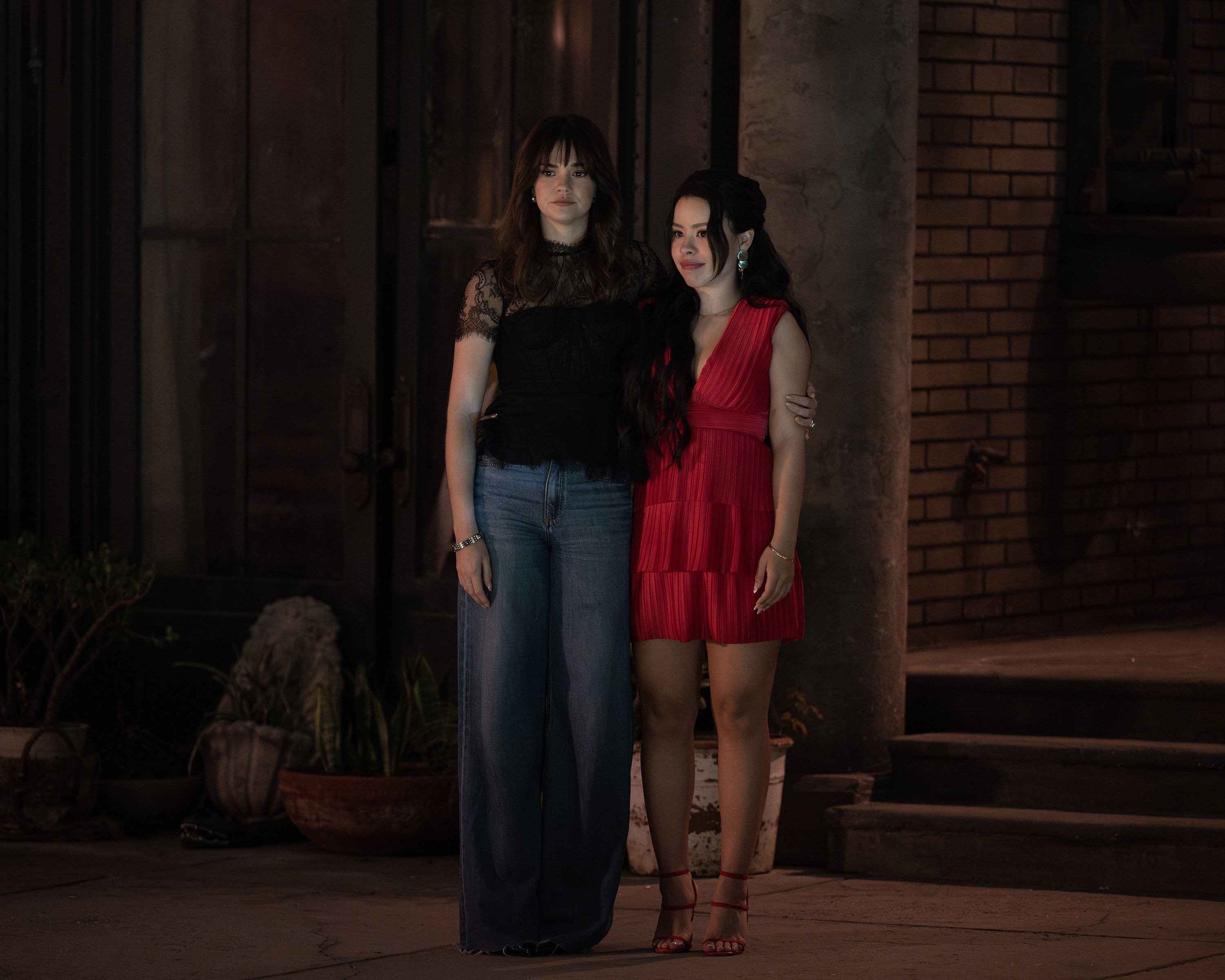 Maia Mitchell and Cierra Ramirez standing side-by-side in "Good Trouble"