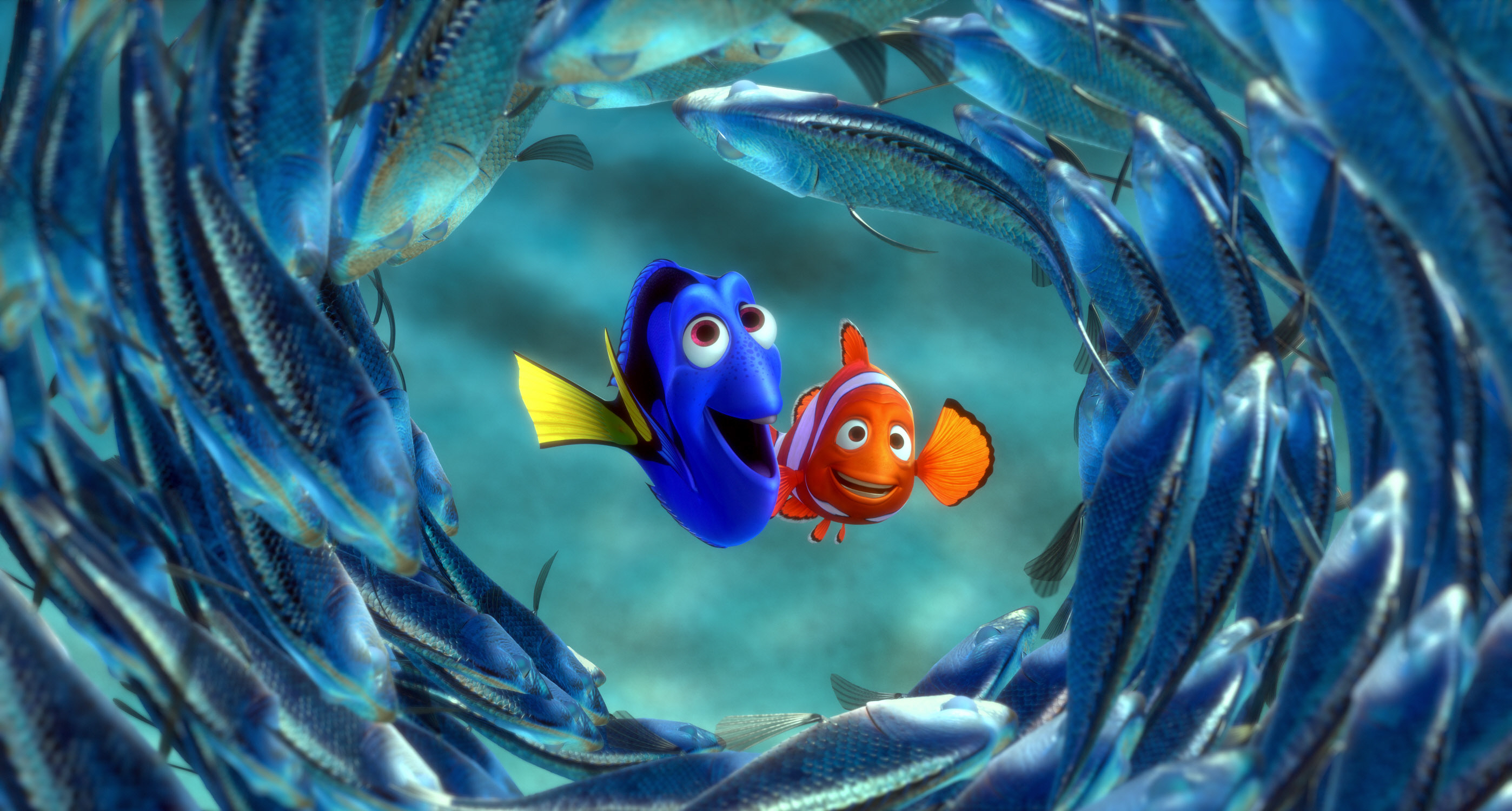 Dory and Marlin from "Finding Nemo" swim in the center of a swirling school of fish