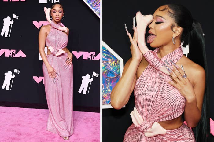 Saweetie in a sparkly gown poses on the red carpet and playfully licks a prop at the MTV VMAs
