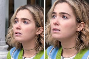 Haley Lu Richardson stands outside, wearing a beaded choker necklace and a striped top, looking contemplative. This image is used in a travel article