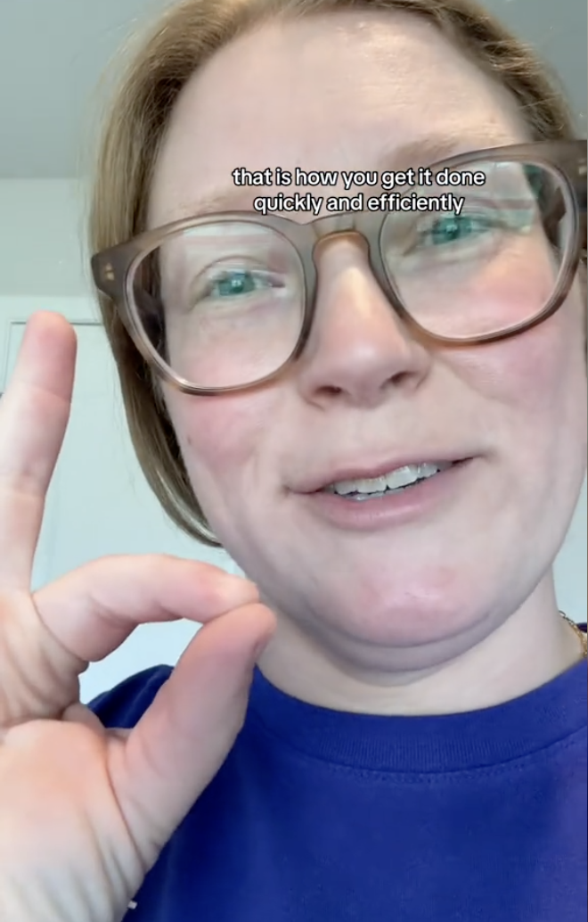 Cindell makes an "OK" hand gesture