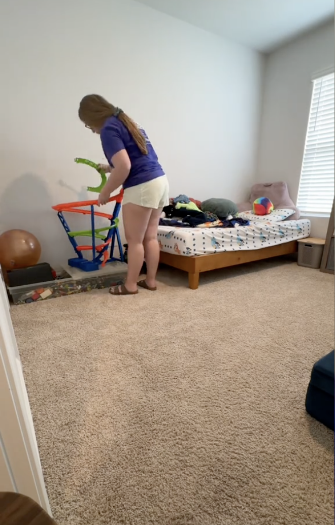 Cindell cleaning her kids' toys