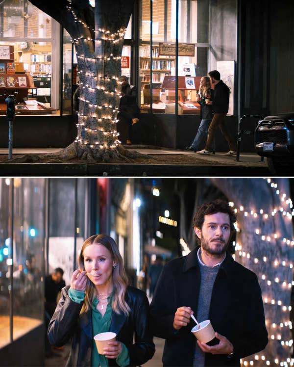 Kristen Bell and Adam Brody eating ice cream while walking past a bookstore with a tree wrapped in string lights