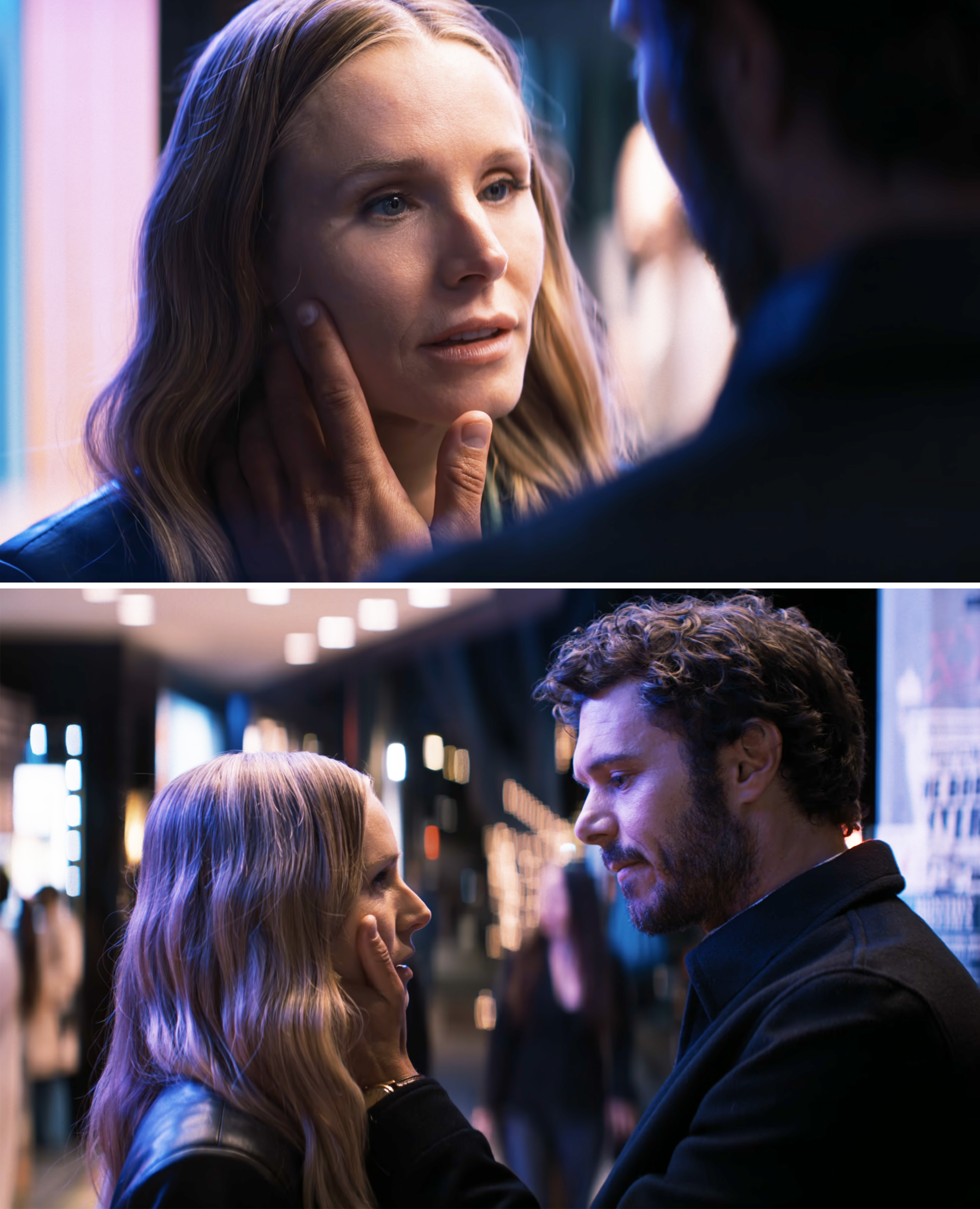 Kristen Bell and Adam Brody share an emotional moment, touching each other's faces, in a dimly lit scene from a TV show or movie