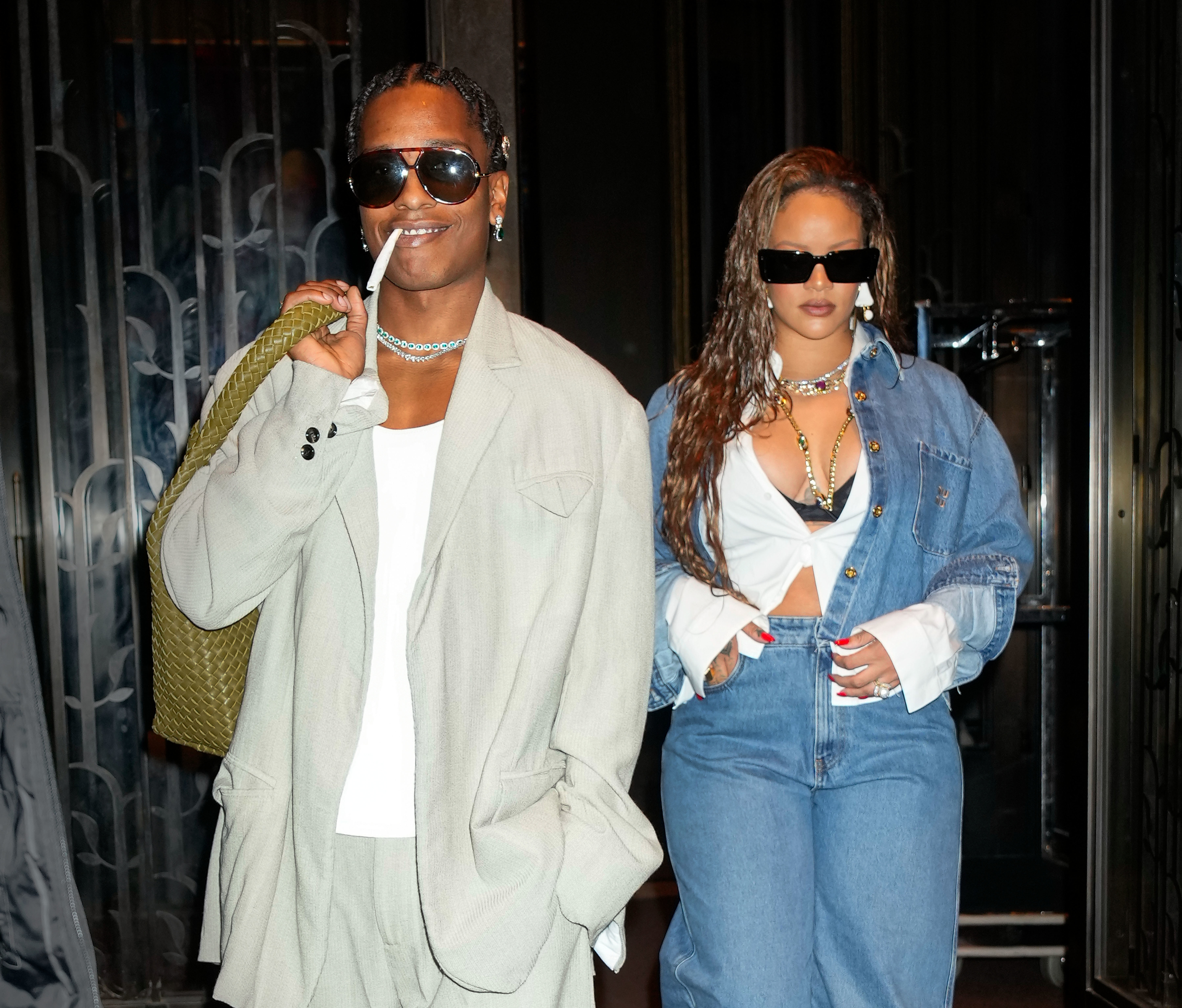 A$AP Rocky in a baggy suit and sunglasses, while Rihanna, on the right, wears denim with bold accessories