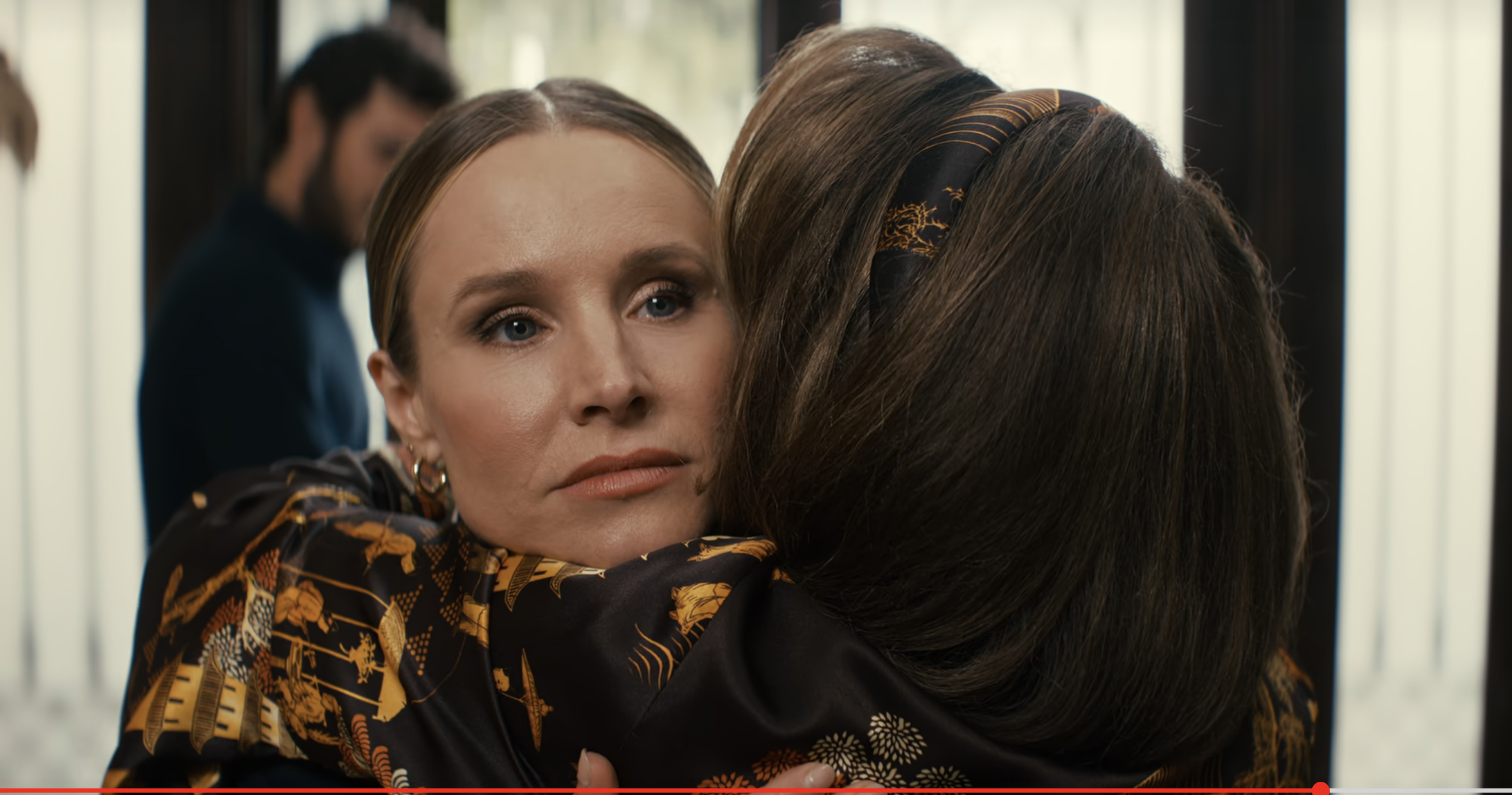 Kristen Bell embraces Tovah Feldshuh in a scene from &quot;Nobody Wants This,&quot; with Adam Brody in the background