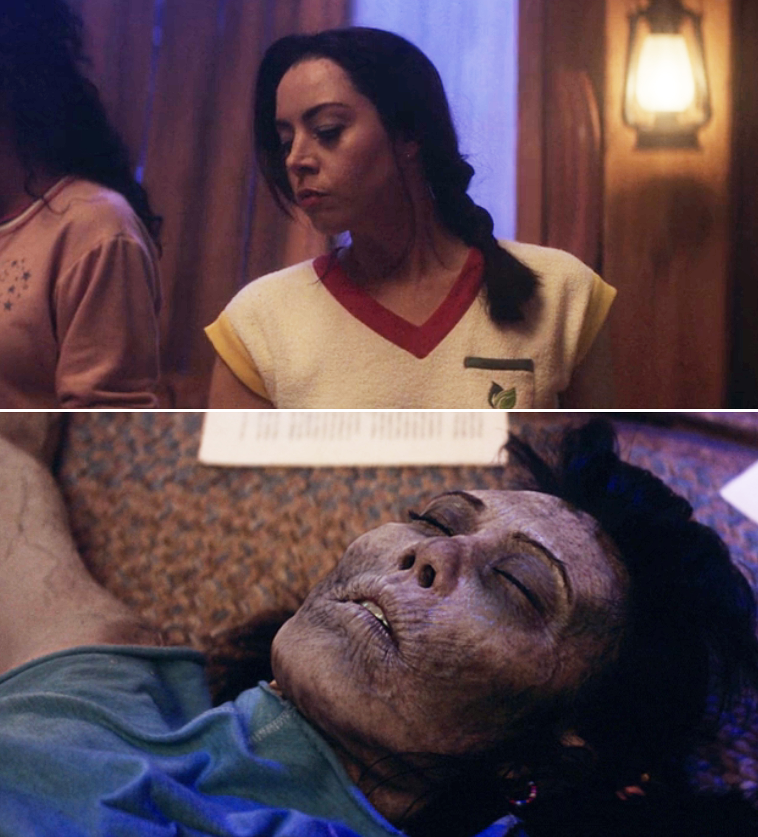 Rio looking down at Alice's dead body, which is grey