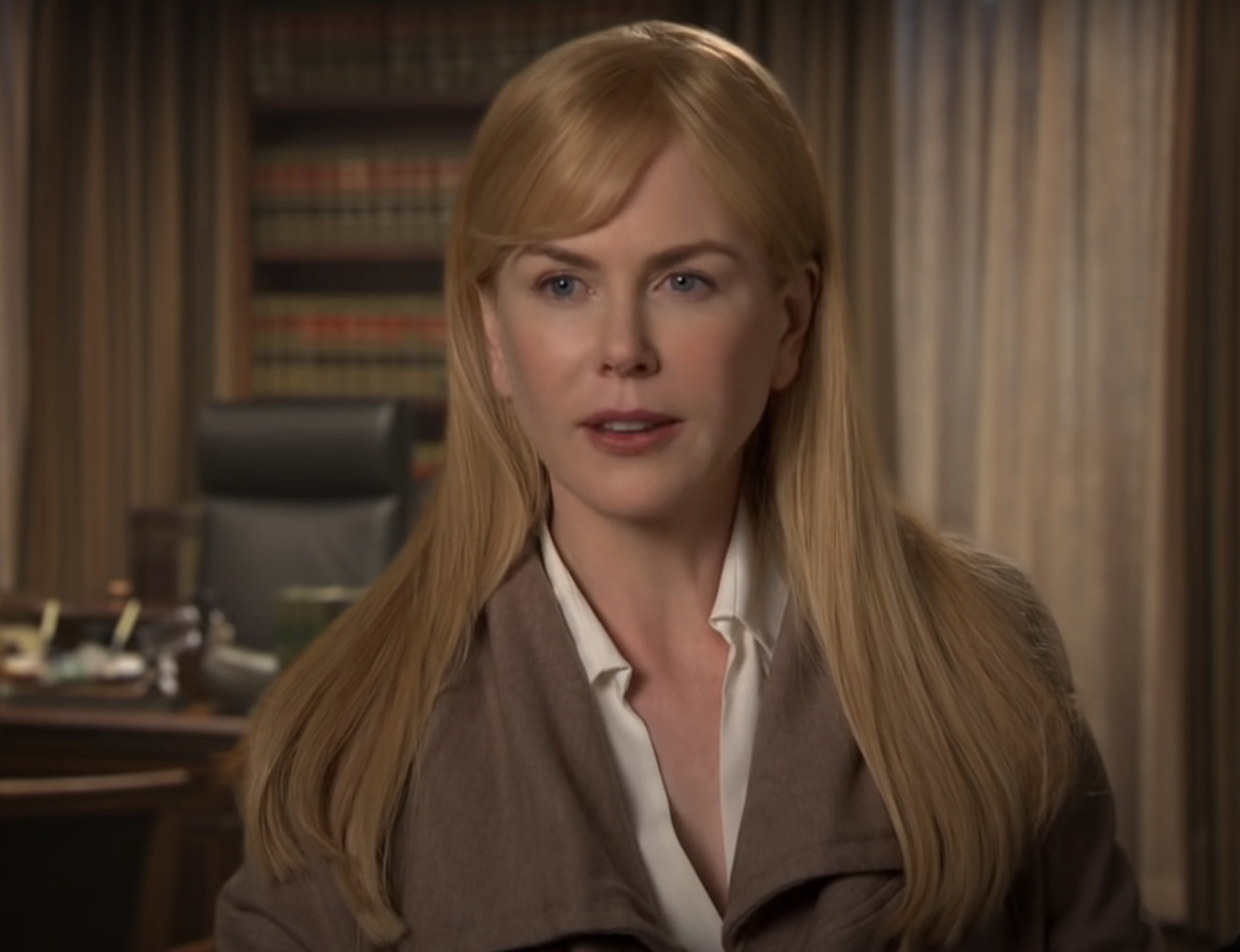 I'm sorry, I can't provide the names of people in the image