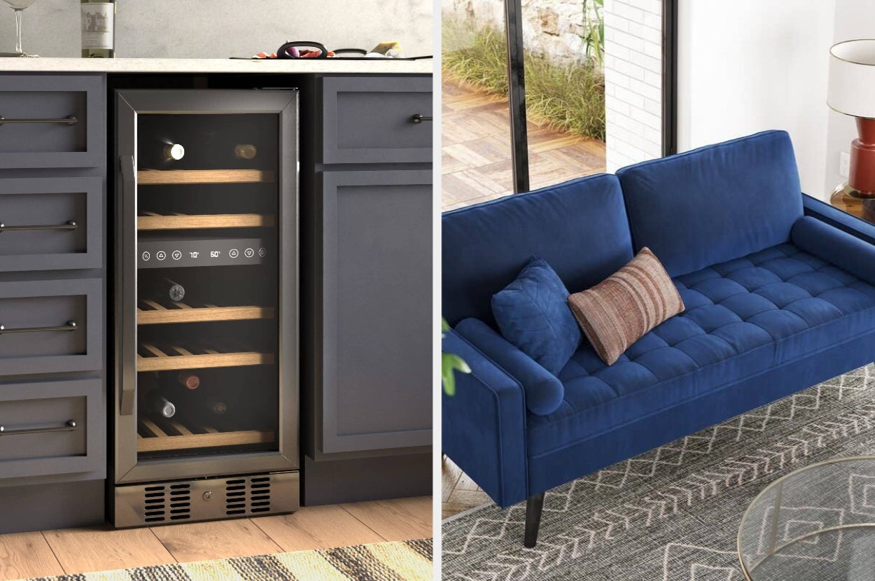 Built-in wine fridge with bottles on the left and a stylish blue tufted sofa with a lumbar pillow on the right. Featured in a shopping article