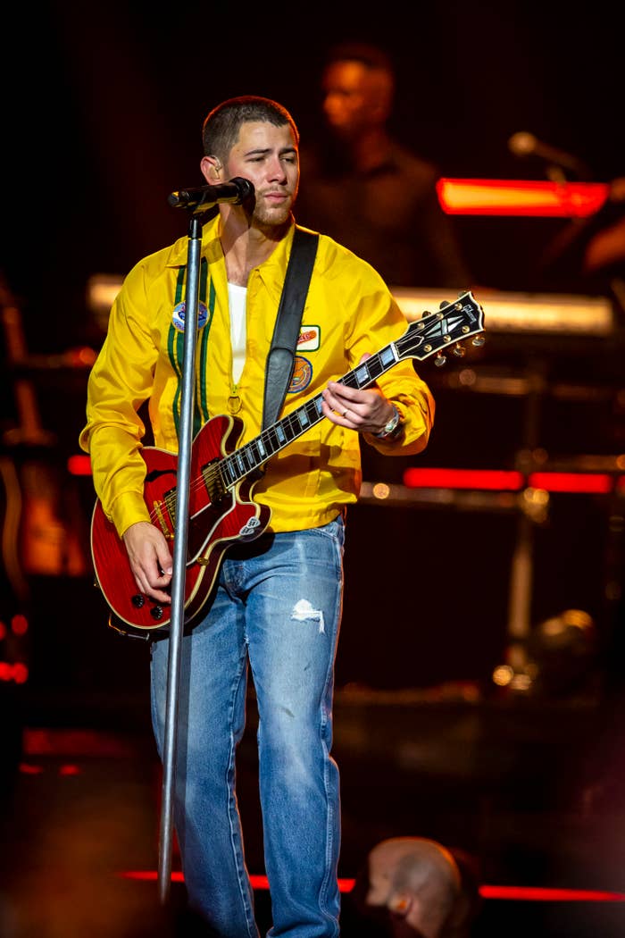 Nick playing the guitar