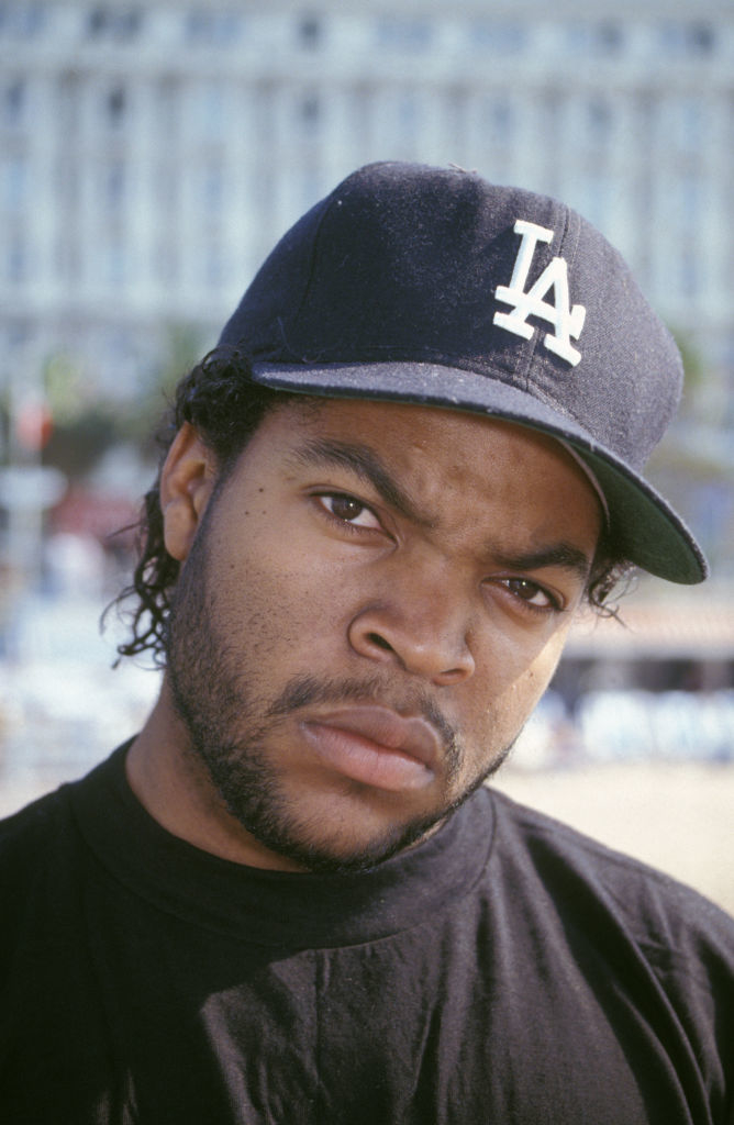 Ice Cube in an LA cap and dark t-shirt