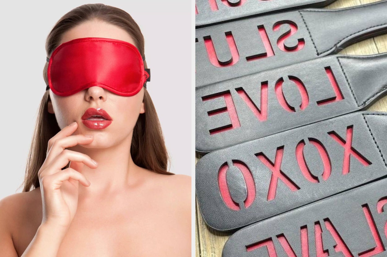 Woman wearing a red blindfold; black leather impact paddles with red cut-out words like "LOVE" and "XOXO."