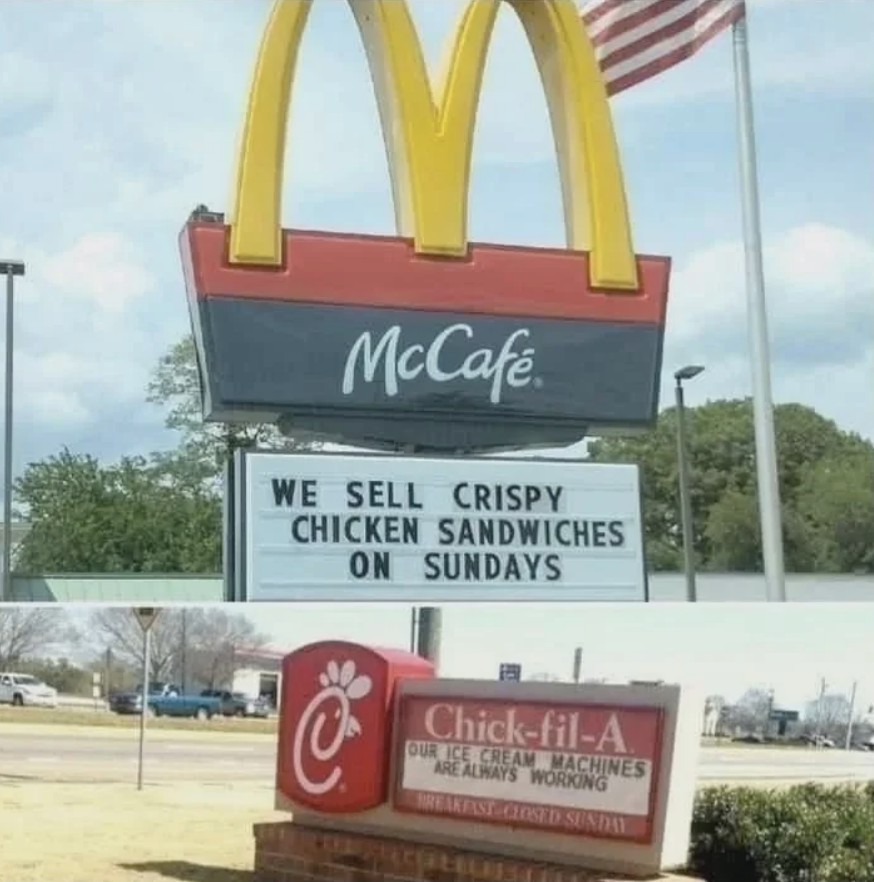 Two signs: McDonald&#x27;s sign advertises crispy chicken sandwiches on Sundays. Chick-fil-A sign notes ice cream machines work but are closed Sundays