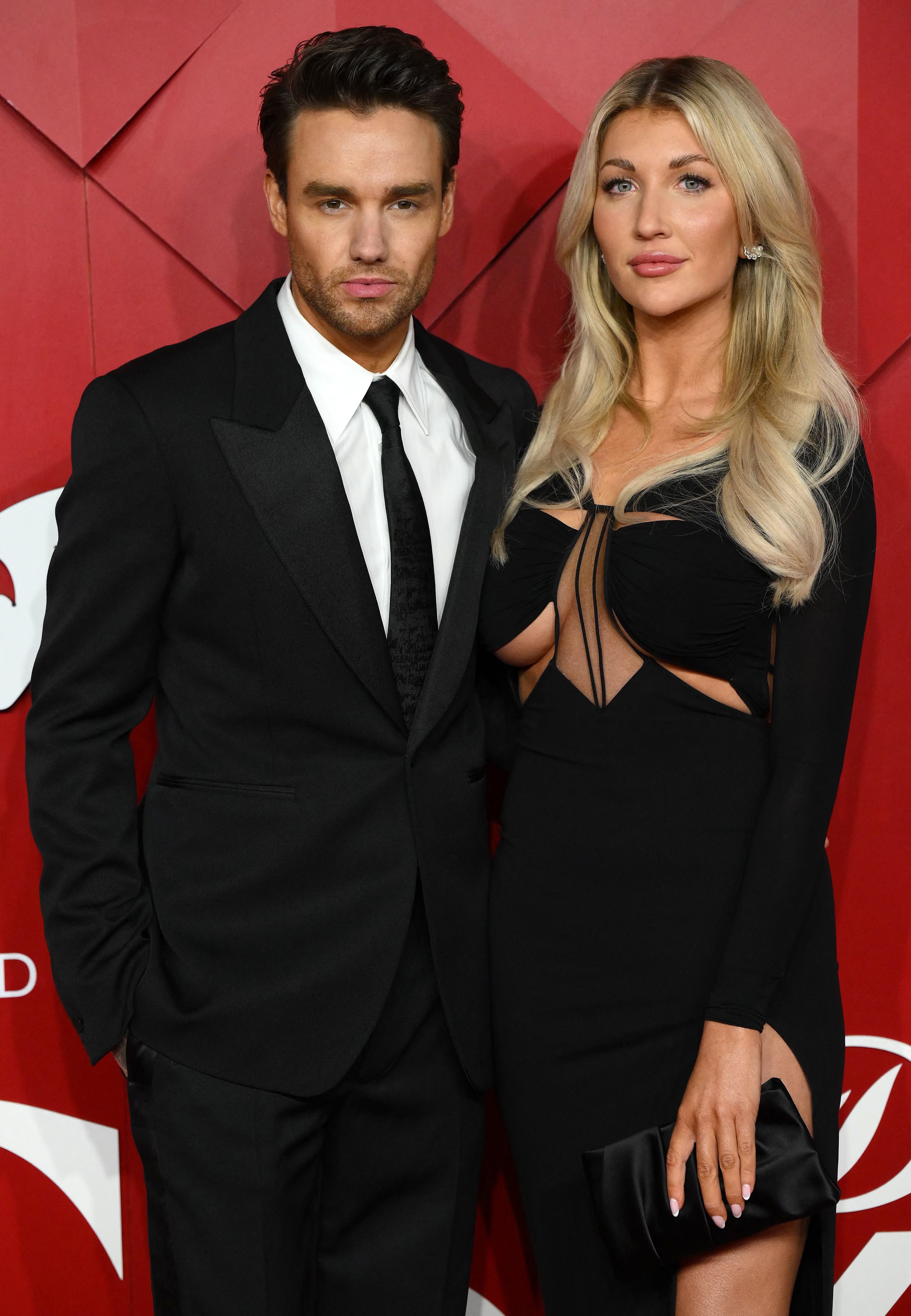 English singer Liam Payne and Kate Cassidy pose on the red carpet upon arrival at The 2022 Fashion Awards in London on December 5, 2022