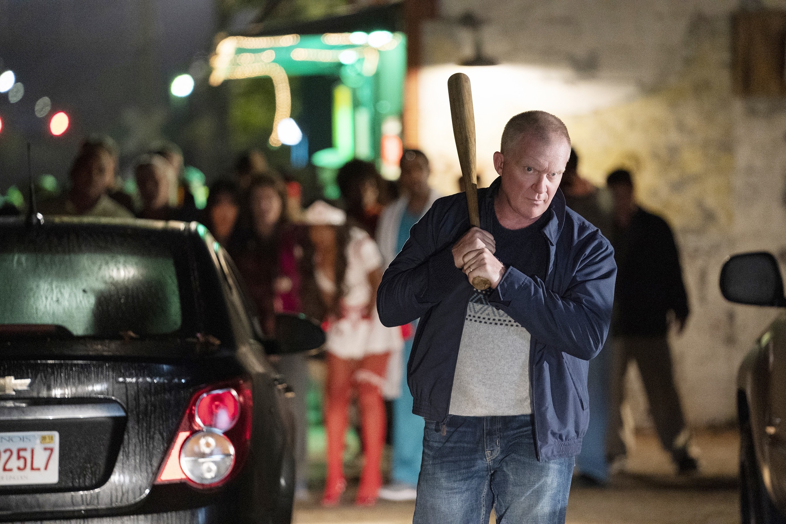 Anthony Michael Hall holding a baseball bat in "Halloween Kills"