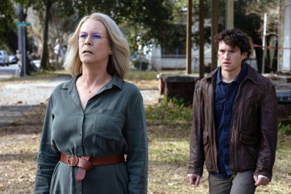 Jamie Lee Curtis and Corey Cunningham standing outside in casual clothing in &quot;Halloween Ends&quot;