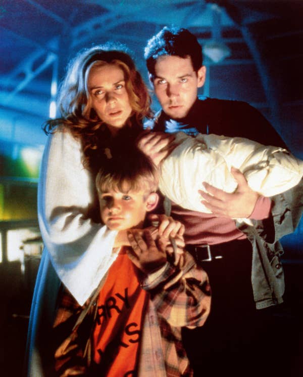 Marianne Hagan, Devin Gardner, and Paul Rudd standing close together in casual clothing in &quot;Halloween: The Curse of Michael Myers&quot;