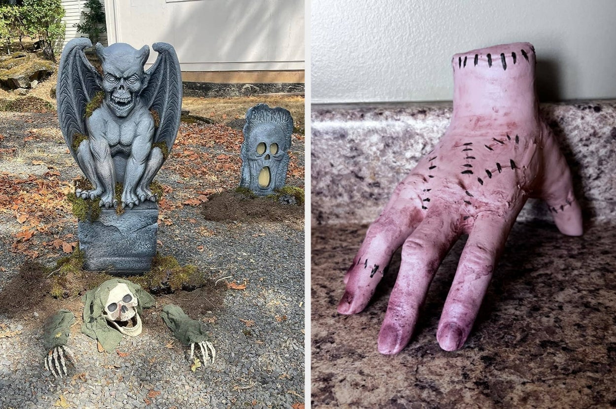 Halloween decorations featuring a gargoyle, skeleton, skull tombstone, and a severed hand with stitches on a tabletop surface