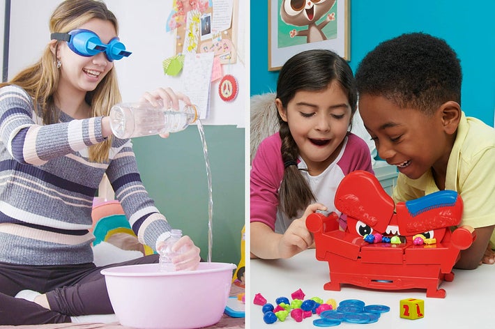 Two children are playing a board game with a plastic chair, and a child with goggles doing a water-pouring challenge next to a pinboard