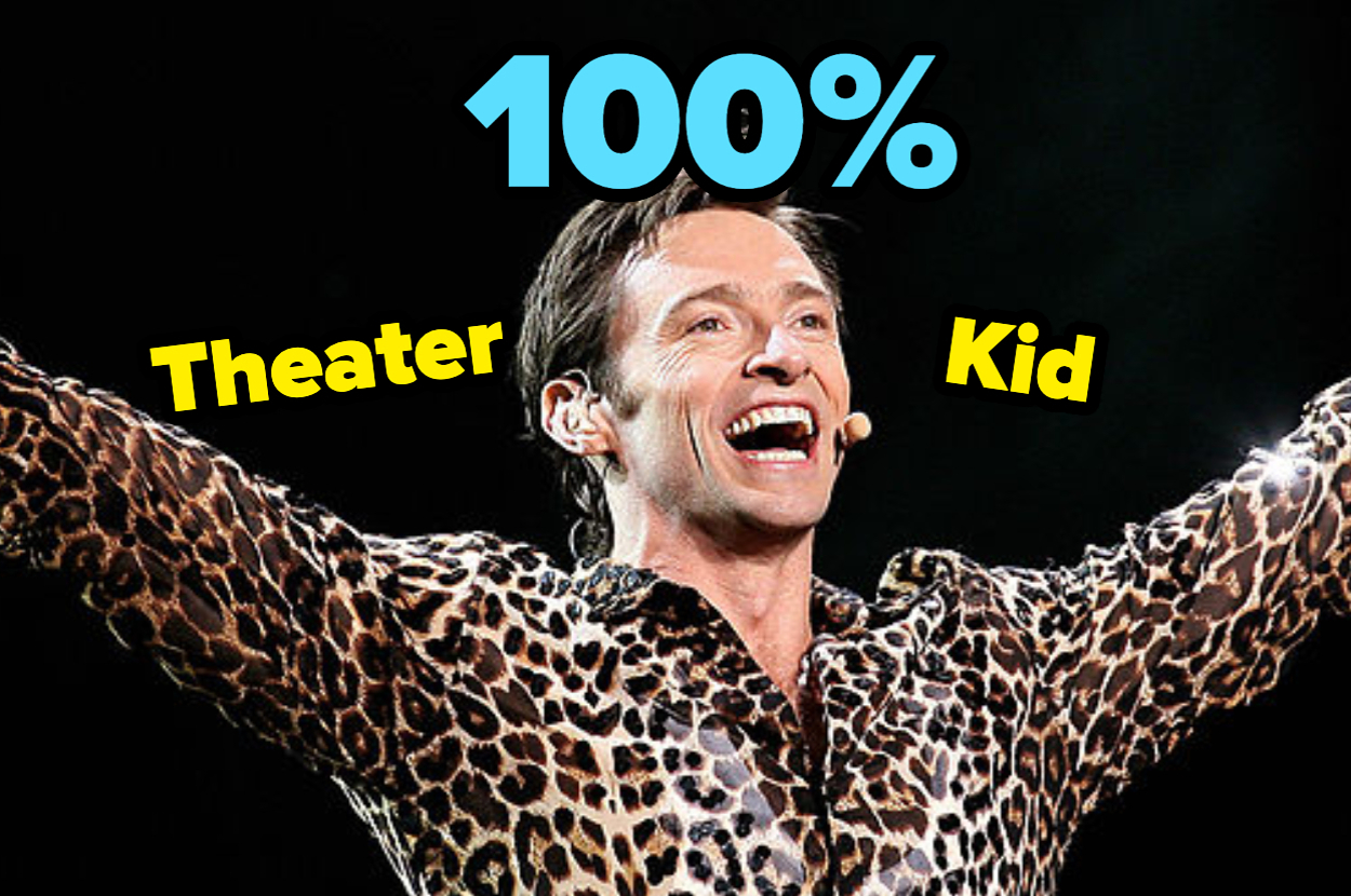 Hugh Jackman smiling, wearing a leopard-print shirt, with arms raised. Text reads, "100% Theater Kid."