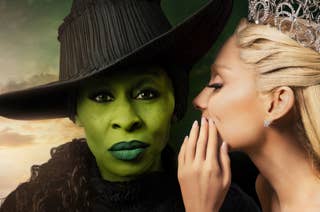 Elphaba in a witch hat with green skin, Galinda in a tiara whispering to her. Text:
