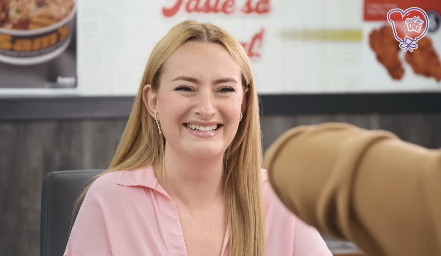 Amelia Dimoldenberg smiles during an interview for "Chicken Shop Date." The video is trending with 6.2M views