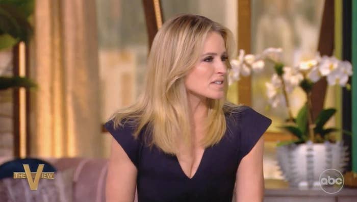 Sarah Haines with straight, shoulder-length hair is talking on The View