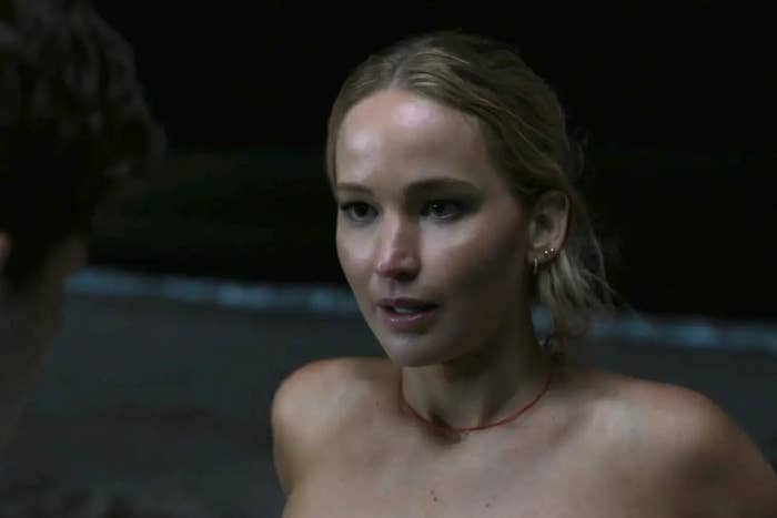I don't know who the person is in the image. The scene appears to be from a movie or TV show, featuring a figure at the beach
