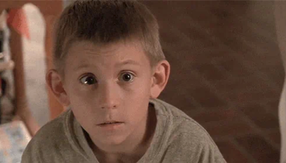 Dewey from Malcolm in the Middle looks up with wide eyes in surprise