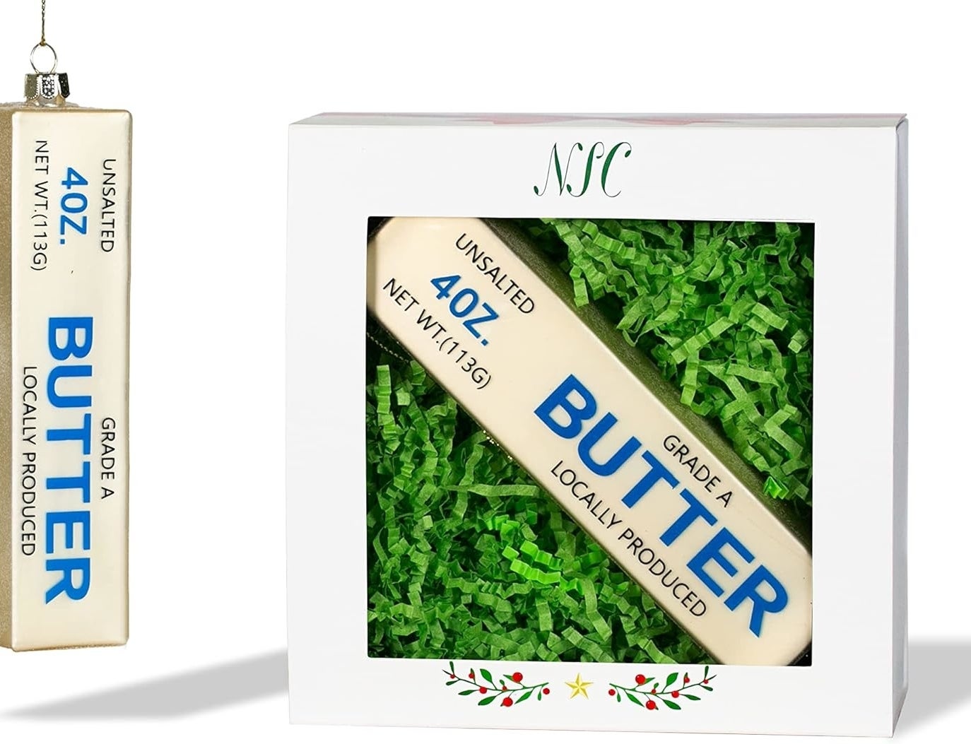 Butter stick Christmas ornament in a festive box with green shredded paper