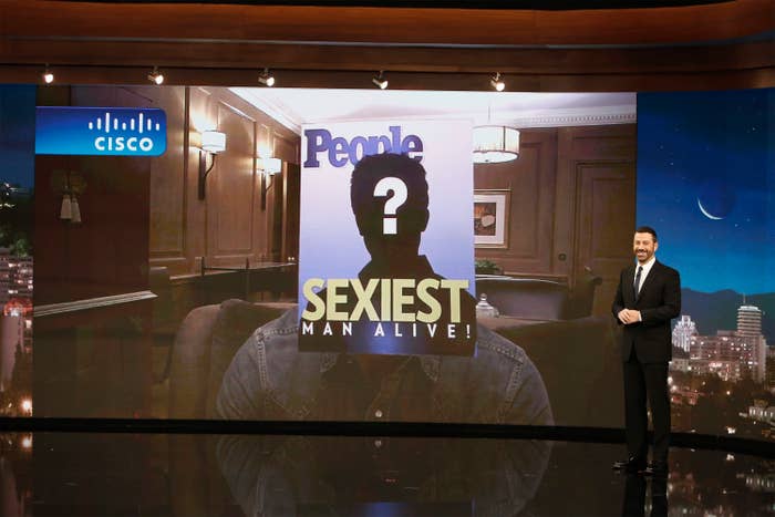 Jimmy Kimmel standing next to a large screen with a mockup of People Magazine's