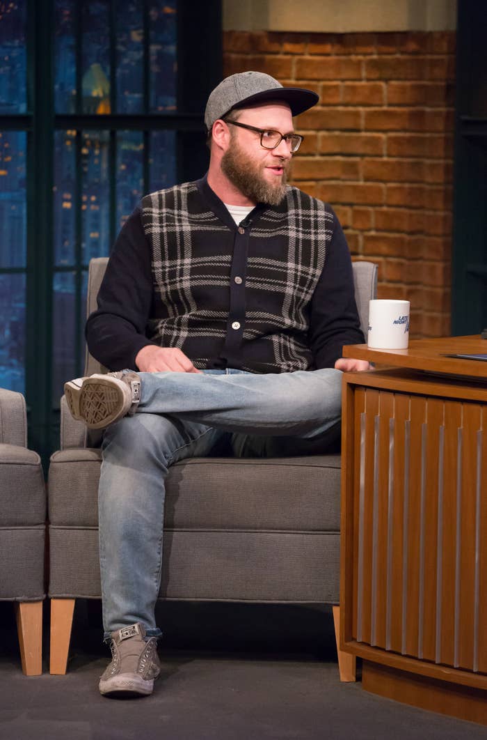 Seth Rogen seated in an interview