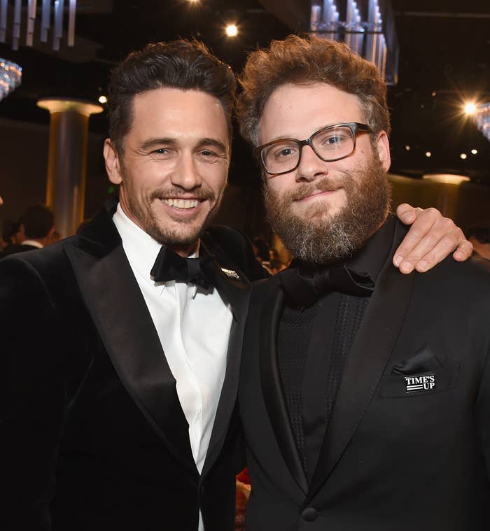James Franco and Seth Rogen pose together at an event in formal suits