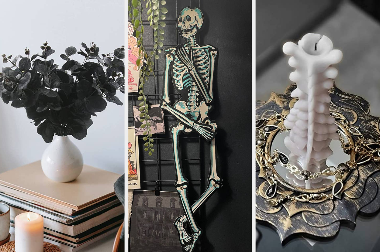 on the left a vase of black eucalyptus branches, on the right a movable paper skeleton