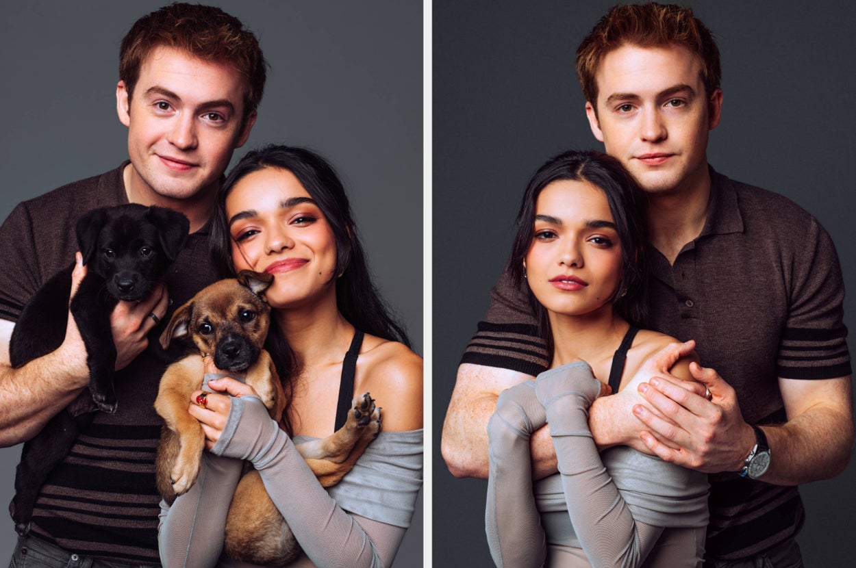 Kit Connor and Rachel Zegler posing for photos with puppies
