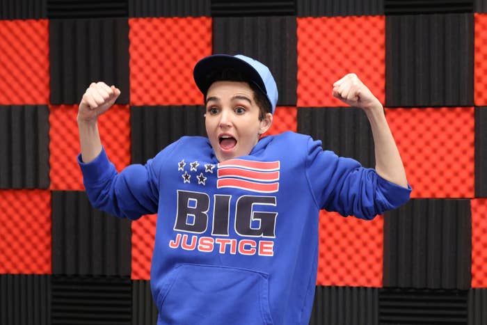 A person in a blue cap and 