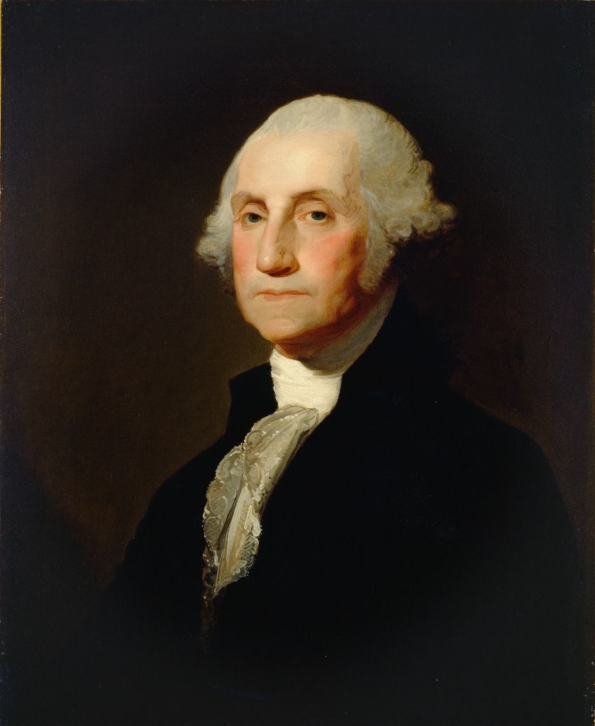 A classic portrait of George Washington in formal 18th-century attire, featuring a white lace cravat and dark coat