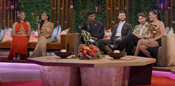 The contestants sitting down