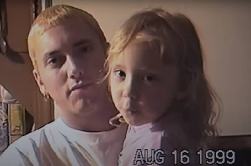 Eminem holds Hailie Jade in 1999