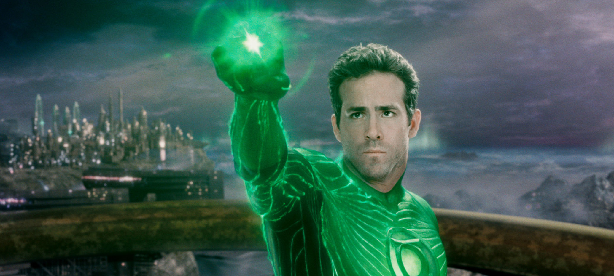 Ryan in a glowing superhero suit holding an energy source, likely from a sci-fi or superhero scene