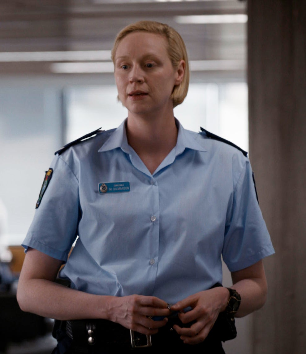 Gwendoline in a police uniform