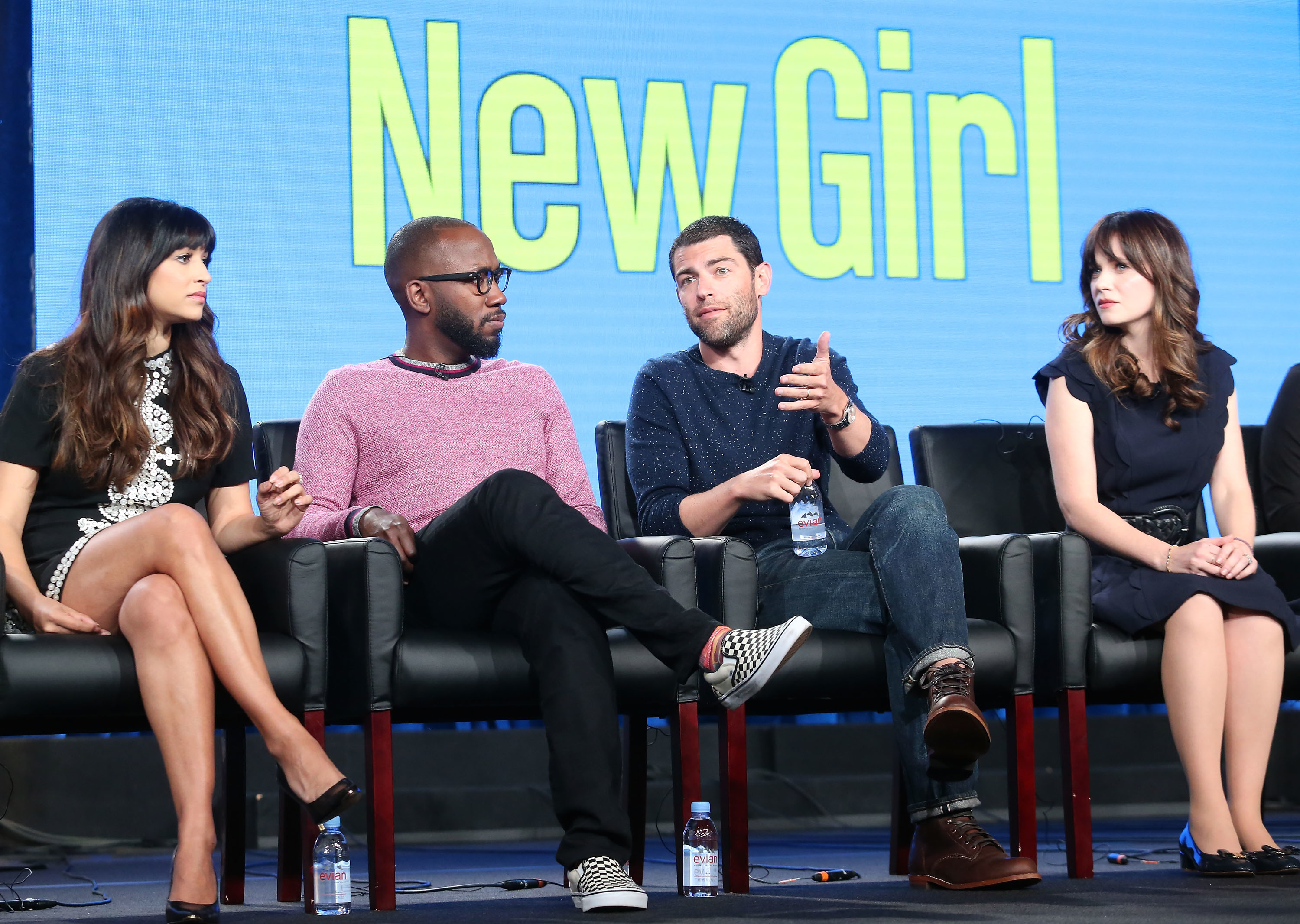 Actors from "New Girl" sit on a panel: Hannah Simone, Lamorne Morris, Max Greenfield, Zooey Deschanel engage in discussion