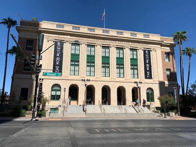 View of The Mob Museum, an iconic building in Las Vegas, with street and signage visible