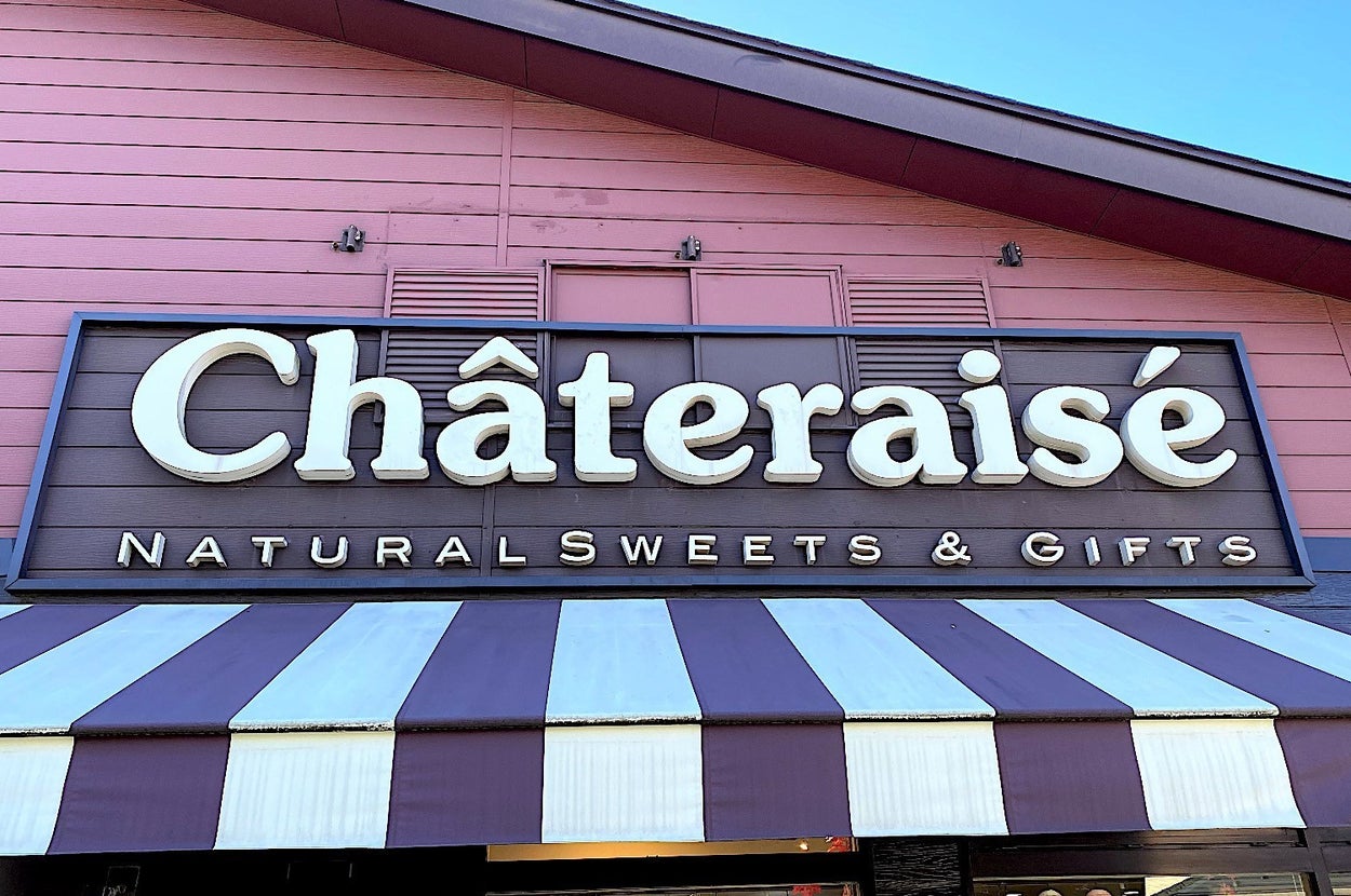 Chateraise storefront with a striped awning and signage reading "Natural Sweets & Gifts."