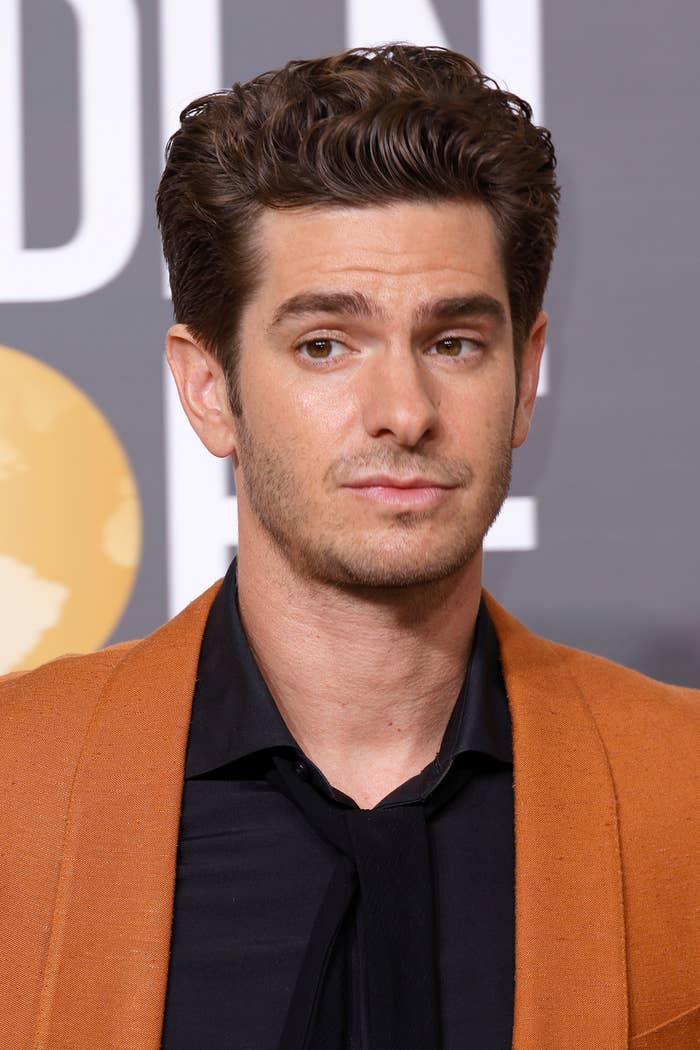 Andrew Garfield in a blazer and collared shirt at the 2023 Golden Globe Awards