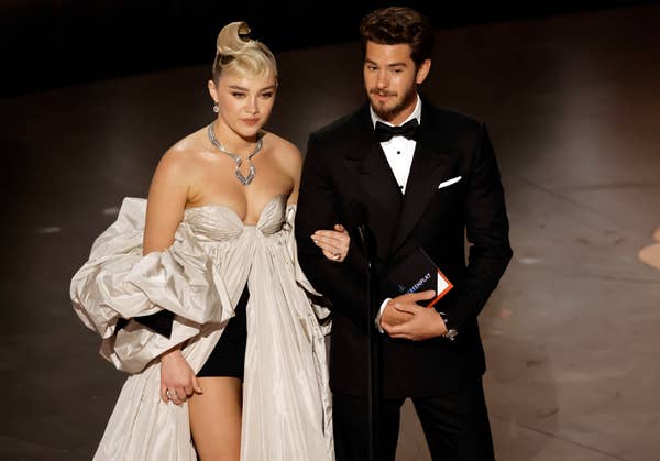 Florence Pugh and Andrew Garfield speak onstage during the Academy Awards in 2023
